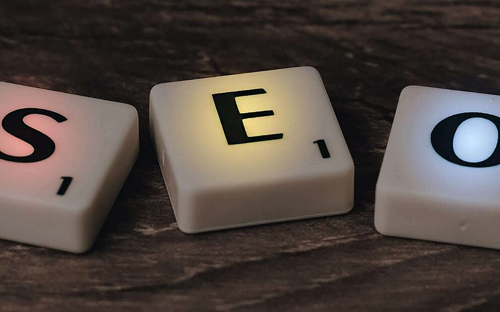 Scrabble tiles that spell SEO.